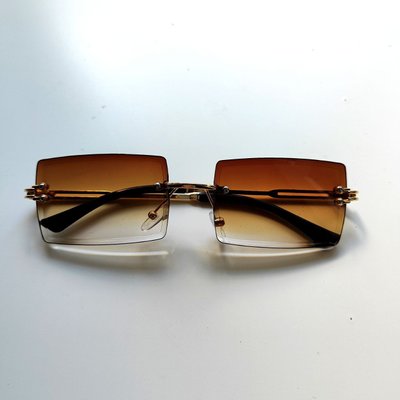 Солнцезащитные очки женские прямоугольные полупрозрачные Gold Tea 33333 фото
